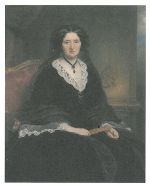 Historische Aufnahme: Eine Person mit dunklem Haar und dunkler Kleidung, vermutlich aus dem 19. Jahrhundert, in einem Innenraum.